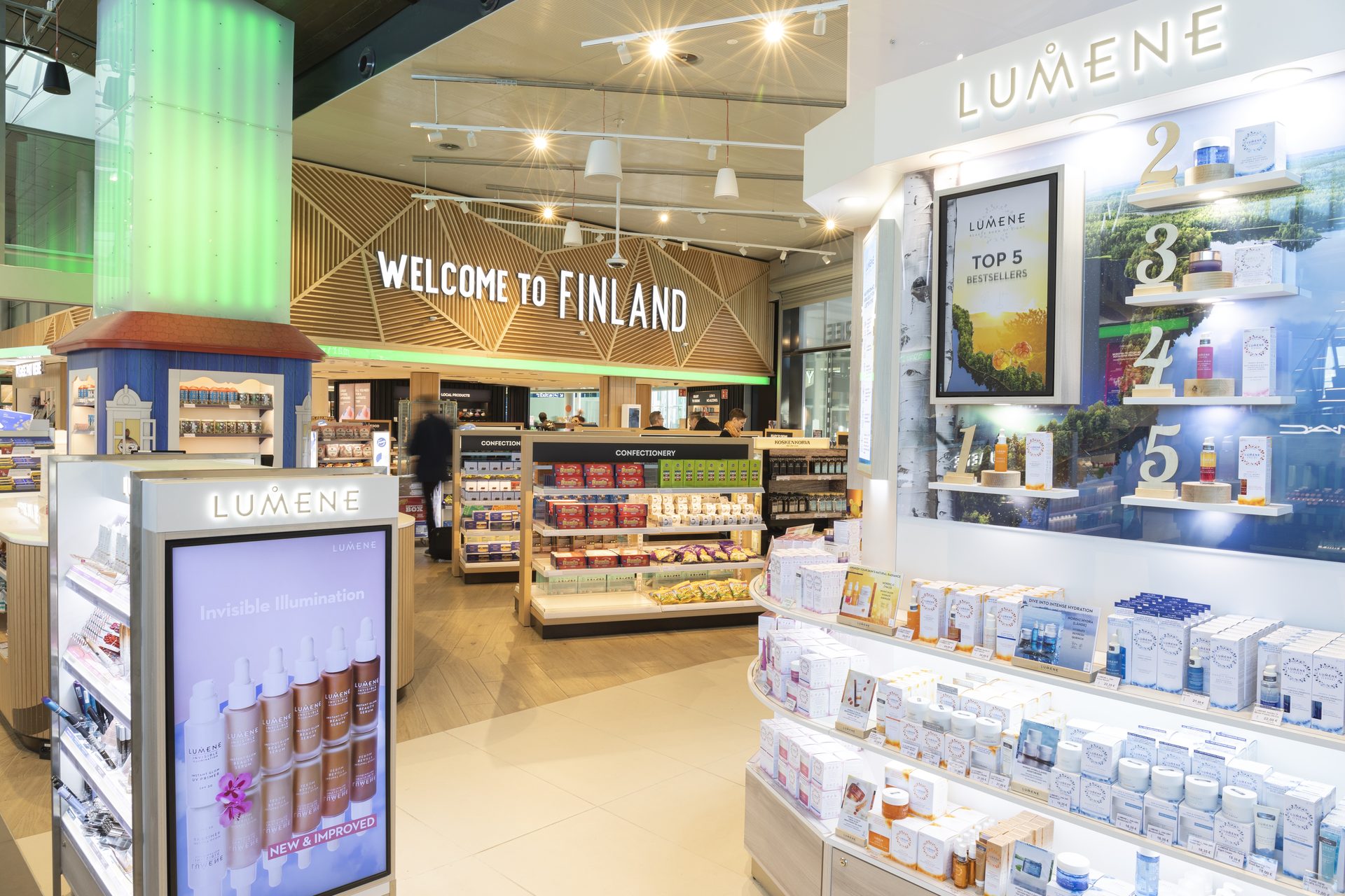 Welcome to Finland airport retail zone with Lumene bestseller wall
